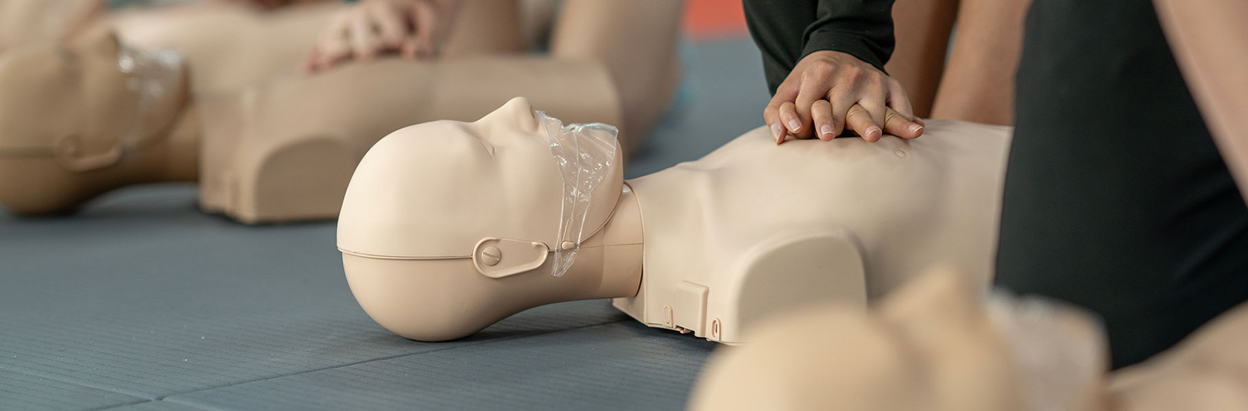 CPR class dummy on floor