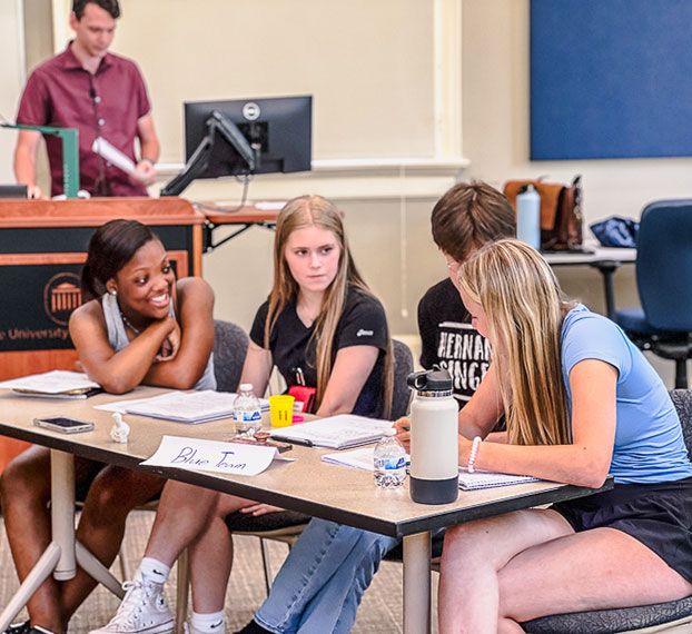 High school students having discussion in classroom