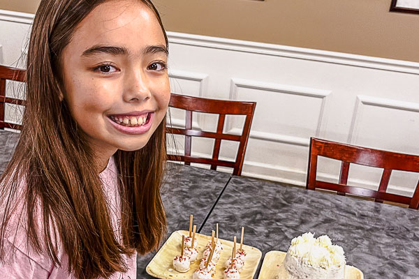 Student with items she baked